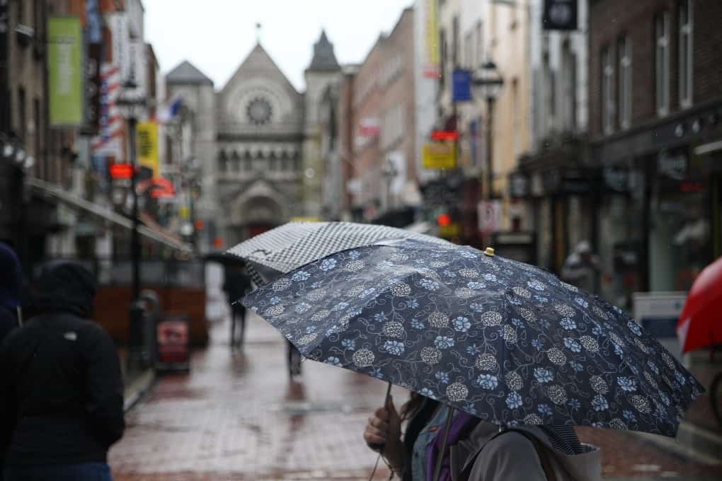 woman in front of a church in dublin