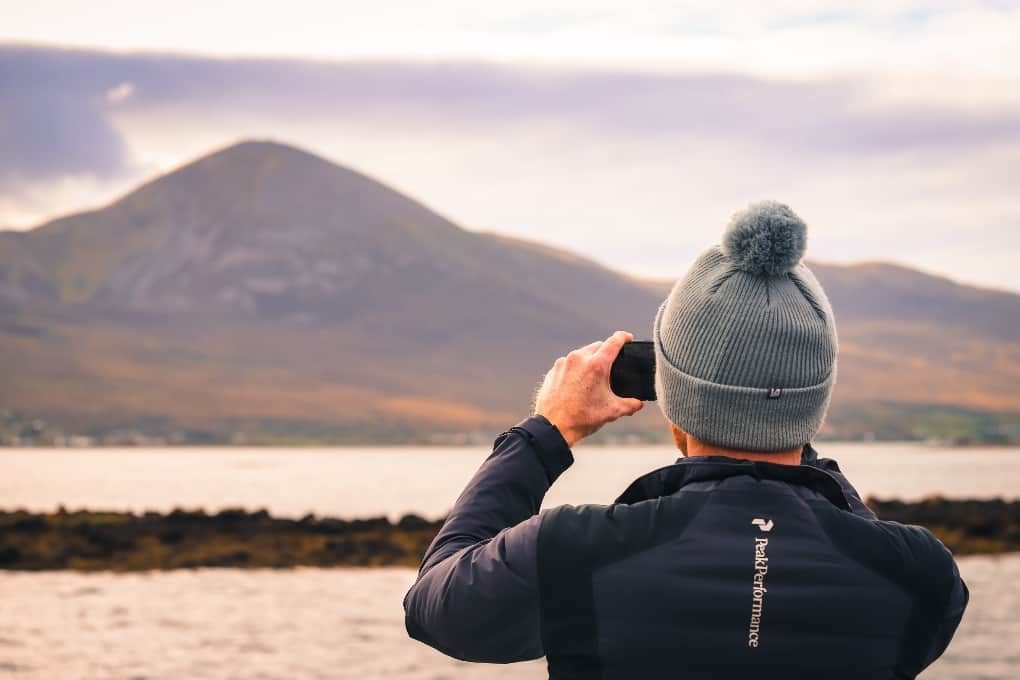 man looking at Croagh Patrick mountain