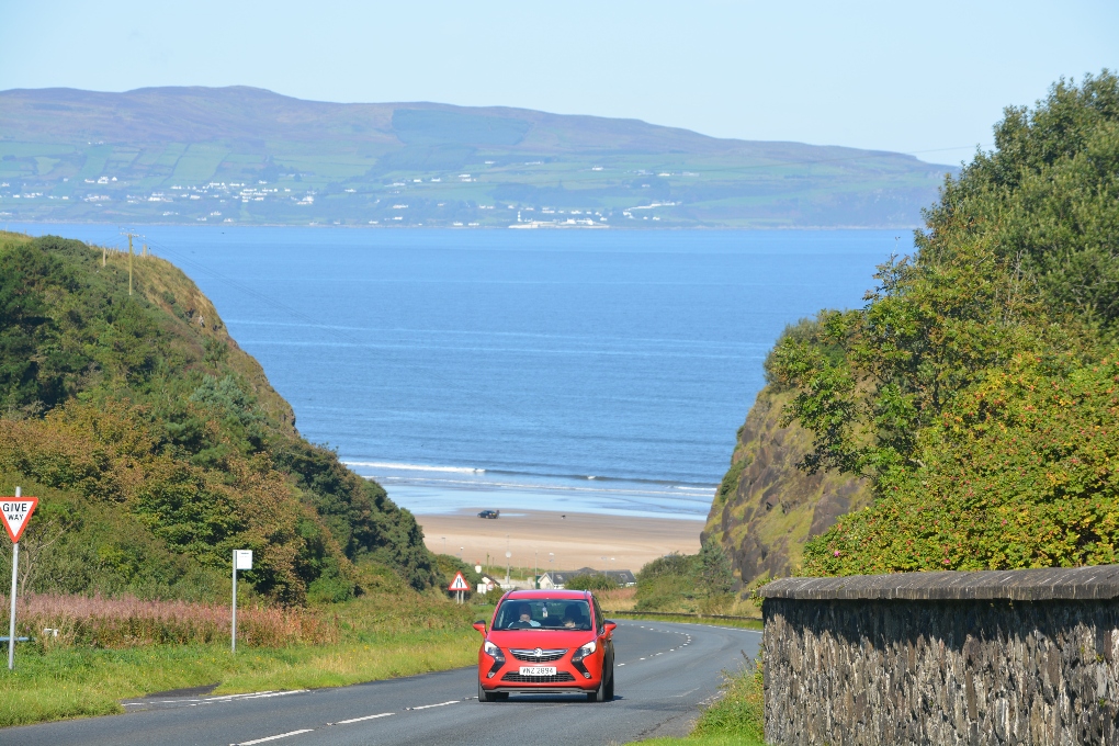 red car driving in Ireland