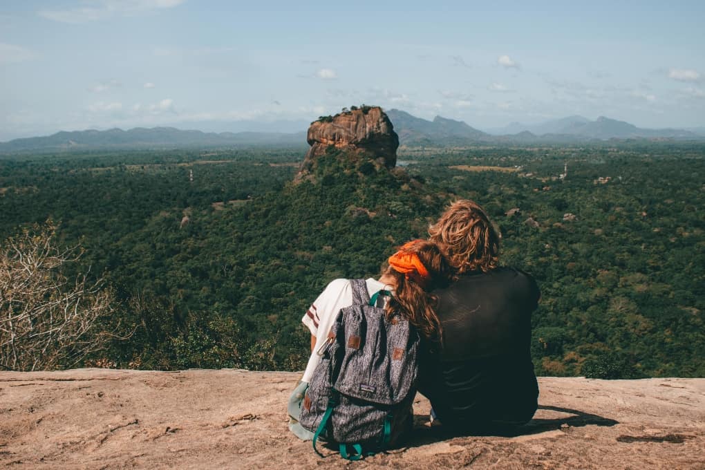 two travelers looking at a view
