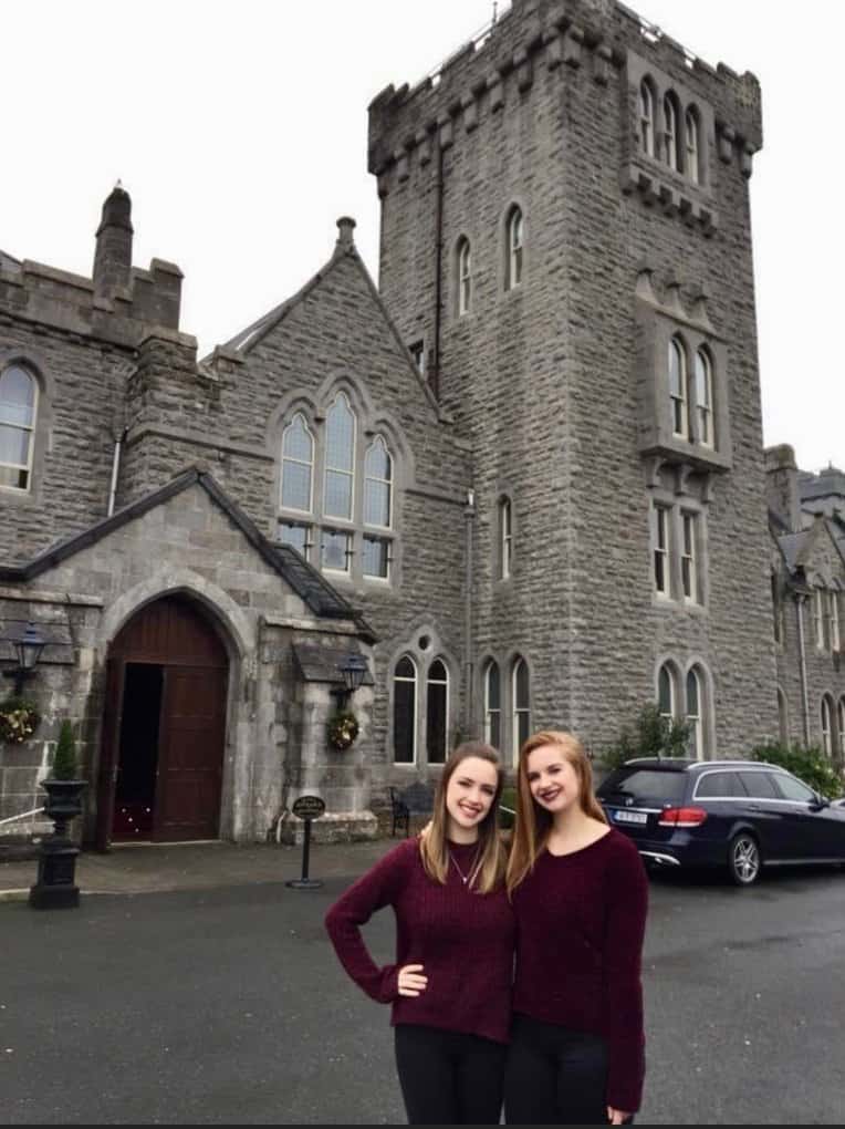 me and sister in front of Kilronan Castle Hotel
