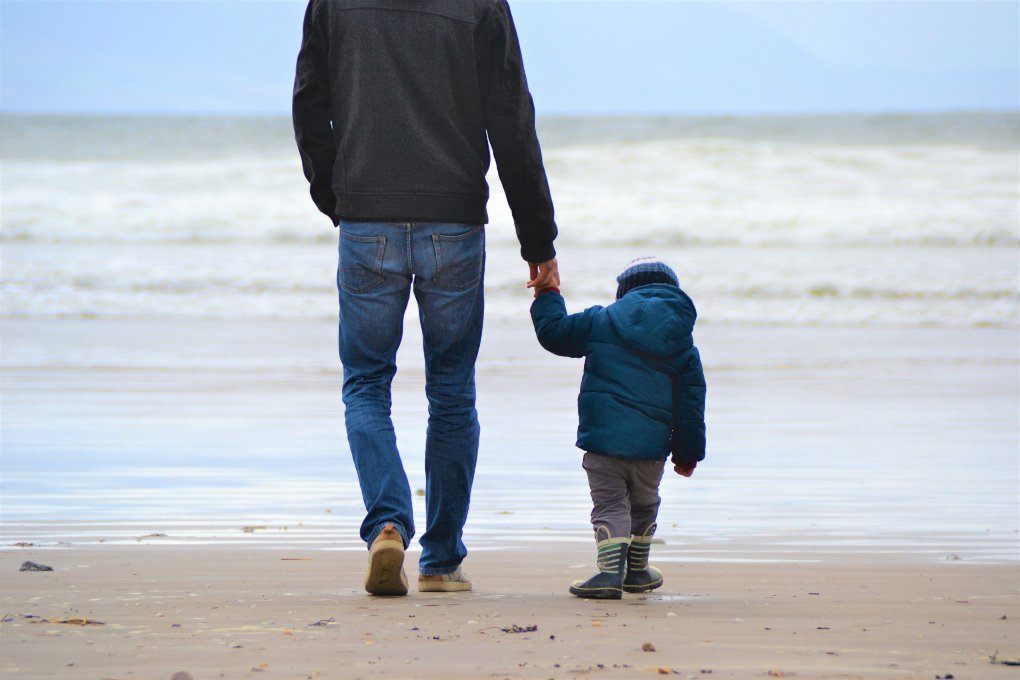 family on Irish beach