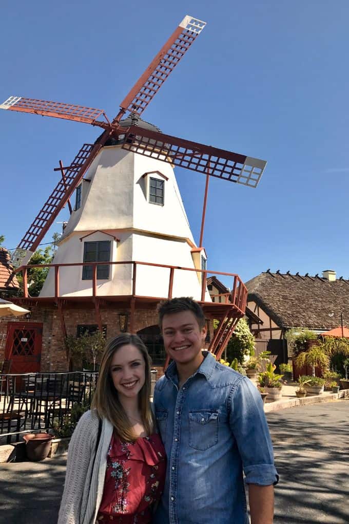 standing in front of the Solvang windmill