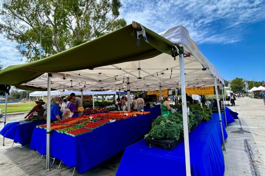 stands at the Torrance Farmers Market