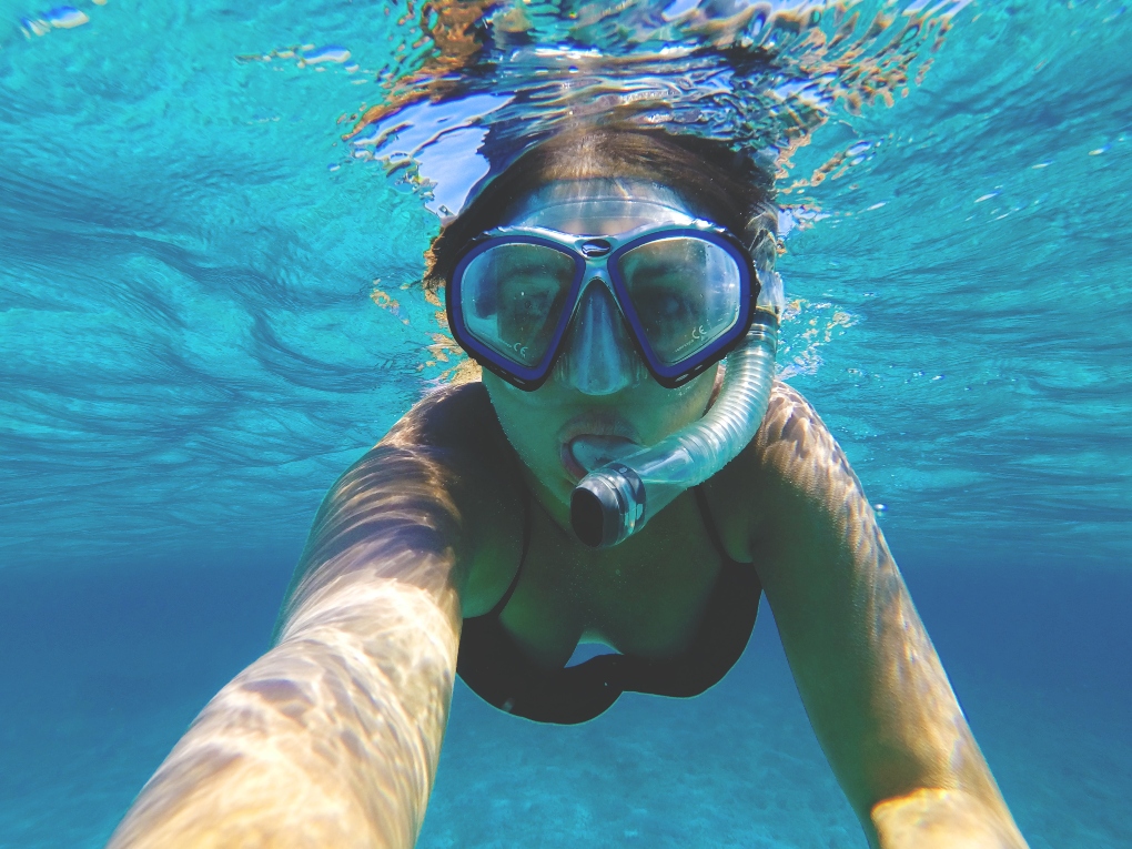 a girl snorkeling