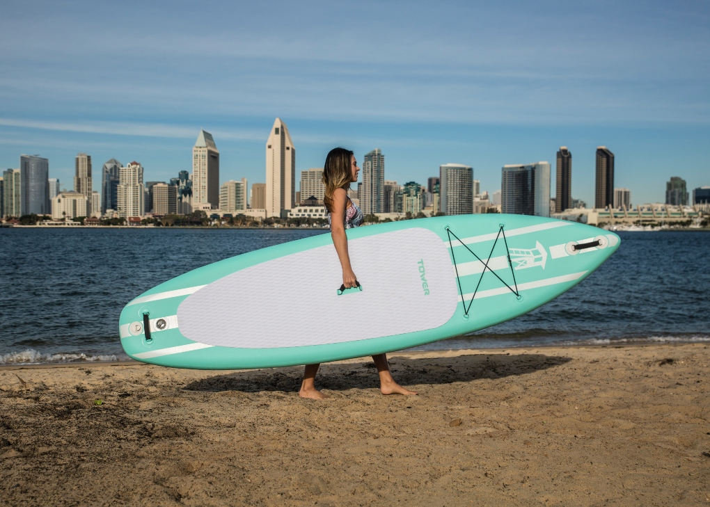 paddleboarding walking along San Diego's waterfront