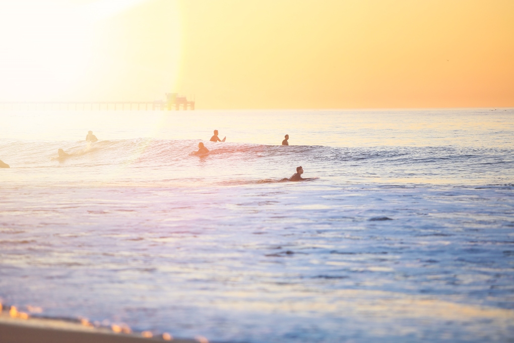 surfers in Newport Beach