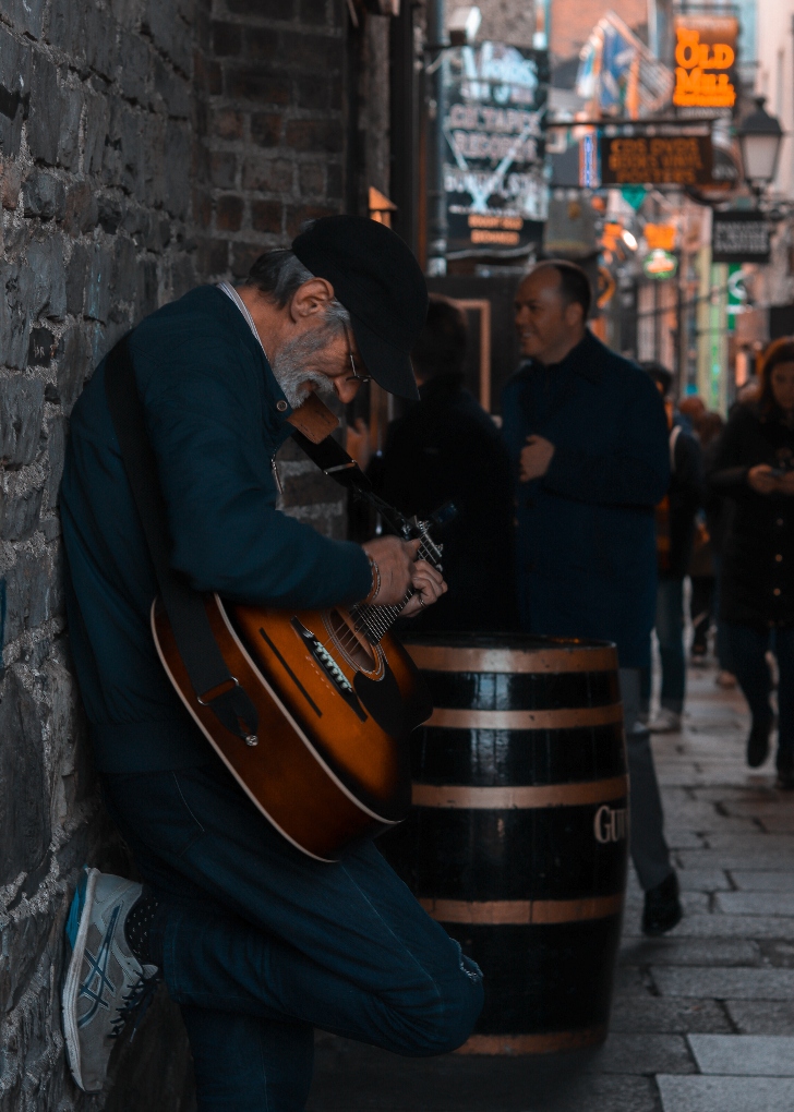 man playing an Irish instrument
