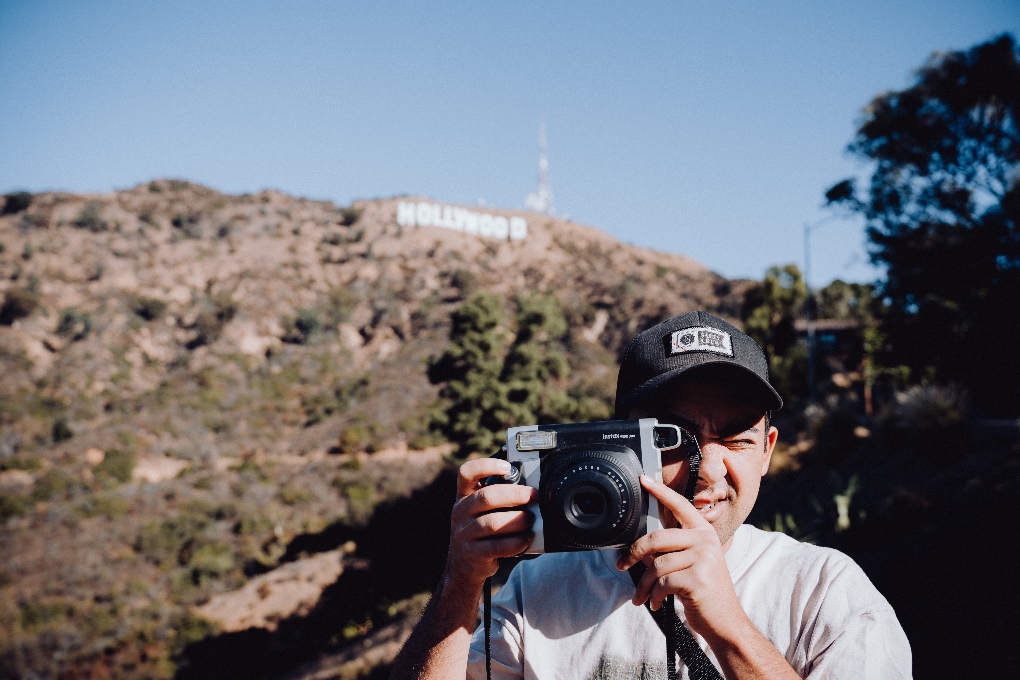 photographer in front of Hollywood sign